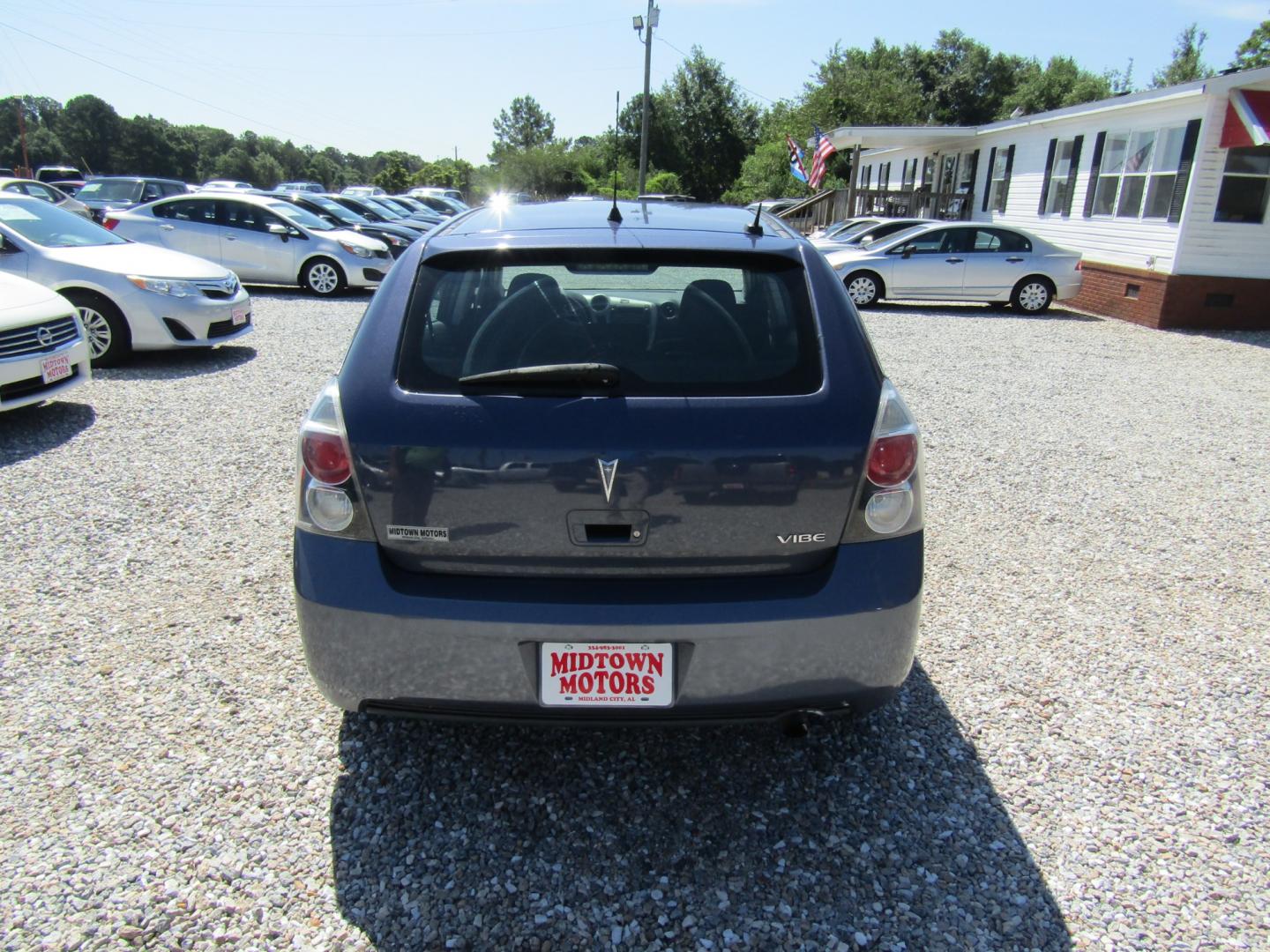 2009 Blue /Gray Pontiac Vibe 1.8L (5Y2SP67819Z) with an 1.8L L4 DOHC 16V engine, 4-Speed Automatic Overdrive transmission, located at 15016 S Hwy 231, Midland City, AL, 36350, (334) 983-3001, 31.306210, -85.495277 - Photo#6